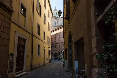 an alley in an old city with buildings at Navona Bernini Lodge in Rome