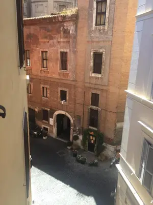 an view of a building from a window at Navona Bernini Lodge in Rome