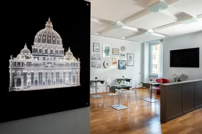 a picture of the united states capitol building on a wall at Mascherino Suites in Rome