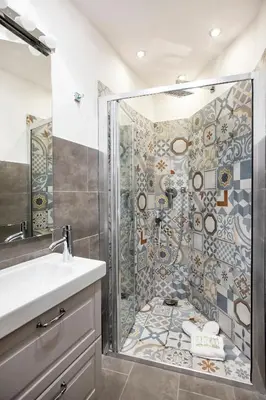 a bathroom with a shower and a sink at Frankie Charme in Rome