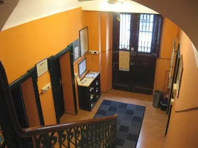 a hallway with a staircase with a door and a room at A Roma San Pietro Best Bed in Rome