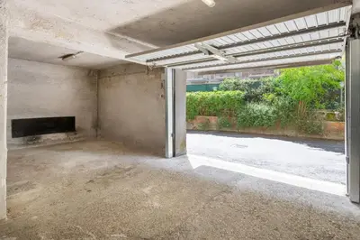 an empty room with an open door to a patio at ROMAN DREAM II in Rome