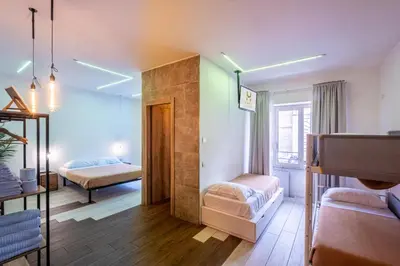 a room with two beds and a room with two beds at My Tiny Home in Rome