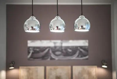 a group of lights hanging from a wall at Verrazzano 37 Guest House in Rome