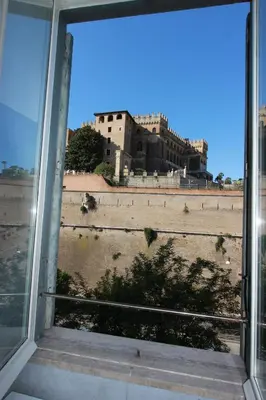 a view of a building from a window at Art Atelier San Pietro in Rome