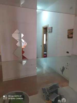 a room with a glass wall with a machine in it at Marco's House in Rome
