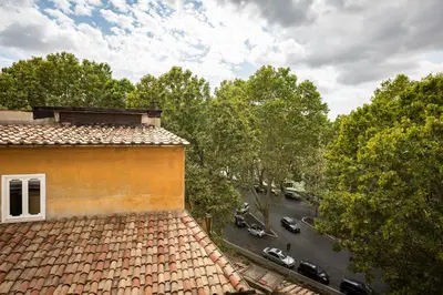 an overhead view of a building and a street with cars at The Imperial Suite in Rome