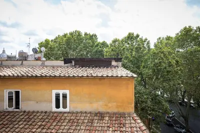 a roof of a building with trees in the background at The Imperial Suite in Rome