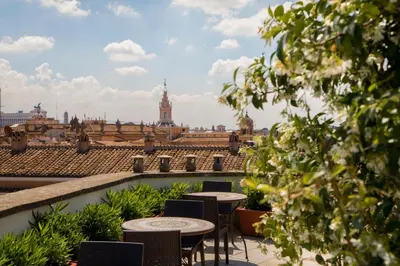 a view of the city from the roof of a building at Antica Dimora De Michaelis in Rome