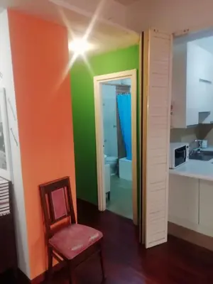 a room with a chair and a star on the wall at Casa di Marco a Trastevere in Rome