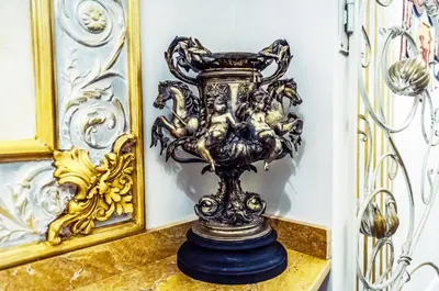 a vase sitting on a shelf in a room at Impero Vaticano Suites Guest House in Rome
