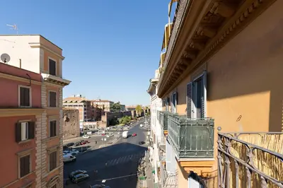 a view of a street from a balcony of a building at Dolce Luxury Rooms in Rome