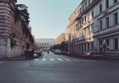 a city street with buildings and people walking on the street at Monti49 GuestHouse in Rome