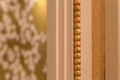 a close up of a bunch of balls on a wall at St. Peter Guest House in Rome