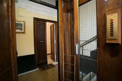 an entrance to a room with a gate and a door at Morin 27 in Rome