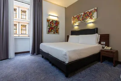 a hotel room with a bed and a window at Trevi Collection Hotel - Gruppo Trevi Hotels in Rome