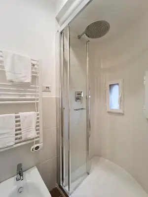 a bathroom with a shower and a sink at La tua casa a Piazza del Popolo in Rome