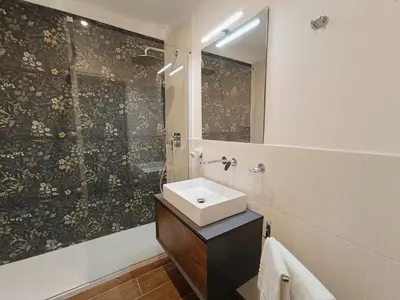 a bathroom with a sink and a shower at La tua casa a Piazza del Popolo in Rome
