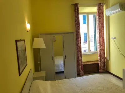 a bedroom with a bed and a window at Casa vacanze 