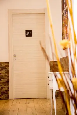 a door with the word spa written on it at Marta Inn in Rome