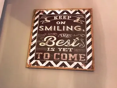 a chalkboard with a sign on a wall at Di Rienzo Residences in Rome