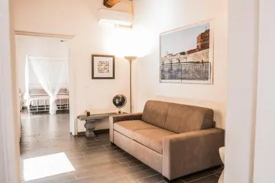 a living room with a couch and a table at Pantheon116 in Rome