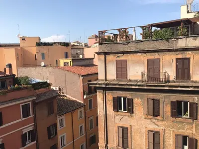 an aerial view of a city with buildings at CoolHouse at Colosseo in Rome