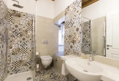 a bathroom with a sink and a toilet at Cozy apartment in via degli Spagnoli - FromHometoRome in Rome