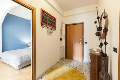 a mirror in a room with a bed and a bedroom at Vatican's Sight in Rome