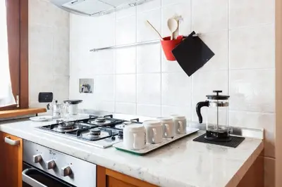 a kitchen with a stove and a counter top at Vatican's Sight in Rome
