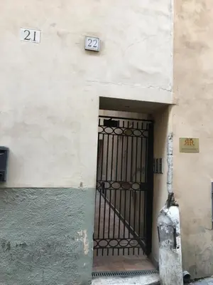 an entrance to a building with a metal door at BB Il Re Alla Reginella Guest House in Rome
