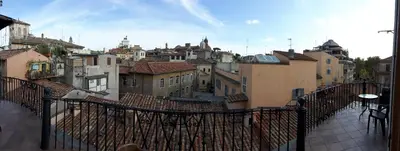 a view of a city from a balcony at BB Il Re Alla Reginella Guest House in Rome