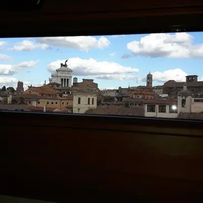 a view of a city from a window at BB Il Re Alla Reginella Guest House in Rome