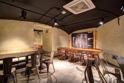 a dining room with a table and chairs at MEININGER Roma Termini in Rome