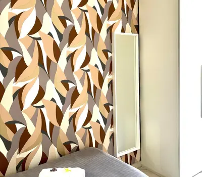 a bedroom with a wall mural with a bed at Enjoy Ponte Lungo in Rome