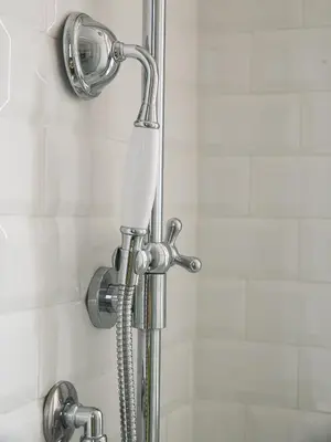 a shower with a shower head and a hose at Domus Claudi Colosseum in Rome