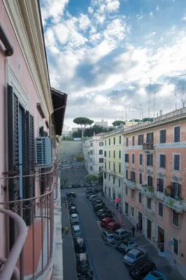 a view of a city street with parked cars at Spartacus Inn Apartment in Rome