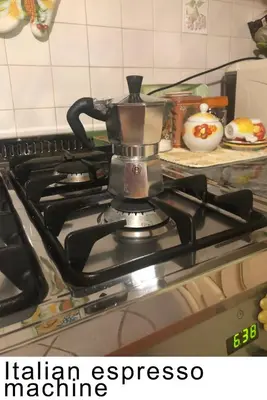 a coffee pot on a stove in a kitchen at Spartacus Inn Apartment in Rome