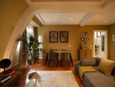 a living room with a couch and a table at Elizabeth Unique Hotel | a Member of Design Hotels™ in Rome