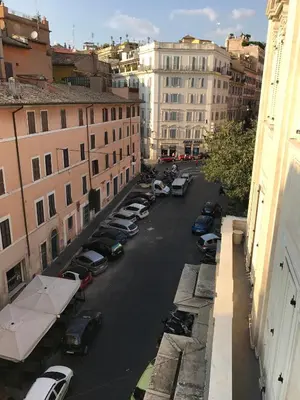 an aerial view of a city street with cars parked at Sweethome Crispi in Rome