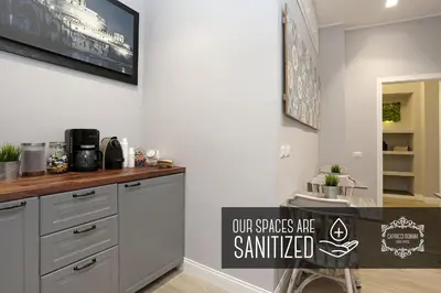 a kitchen with a sign that says our cookies are sampled at Capricci Romani in Rome