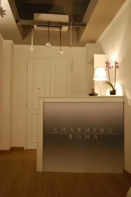 a sign for the channelling roma in a room at Charming Roma in Rome