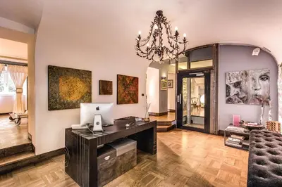 an office with a desk with a computer on it at Hotel Villa Linneo in Rome