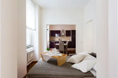 a living room with a couch and a table at The Royal Story in Rome