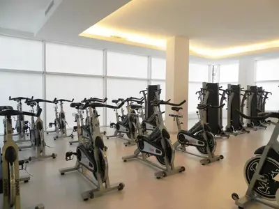 a bunch of exercise bikes in a gym at Lungotevere Suite in Rome