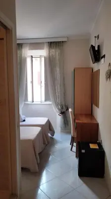 a bedroom with a bed with towels on it at B&B Andy&LU in Rome