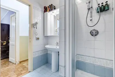 a bathroom with a shower and a sink at BigFamilyRome - Spanish Steps in Rome