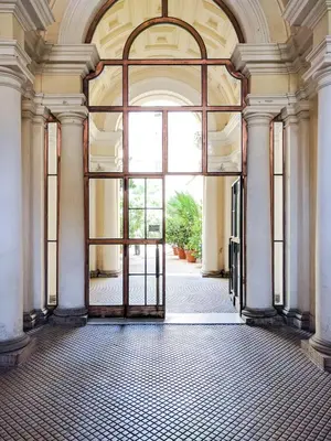 an open door in a building with a large window at Le Stanze Di Federica in Rome