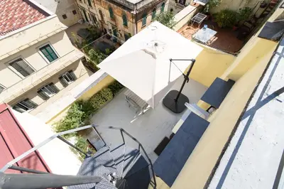 an overhead view of a building with a stair case at White Terrace Ostilia in Rome