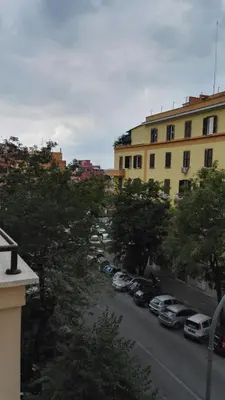 a view from a balcony of a parking lot at Sweet home Appio Latino in Rome